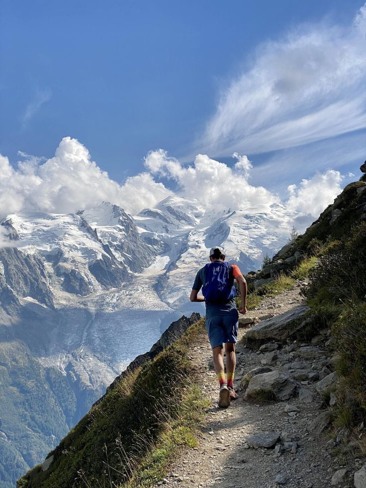 Trail runner on a high mountain path